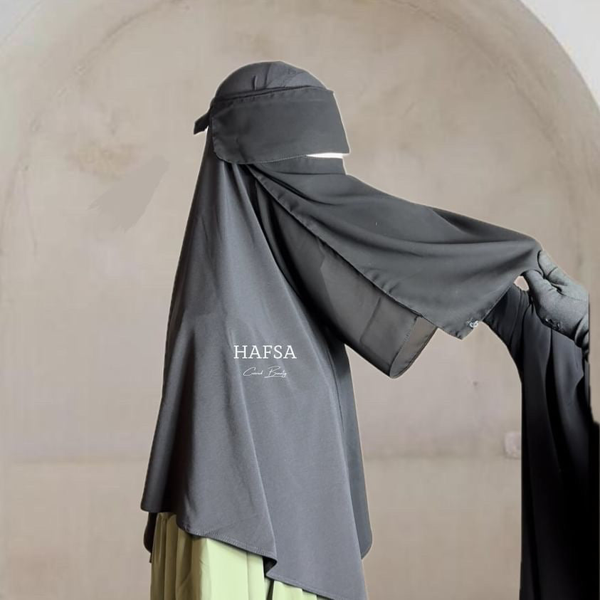 Covered eating Niqab