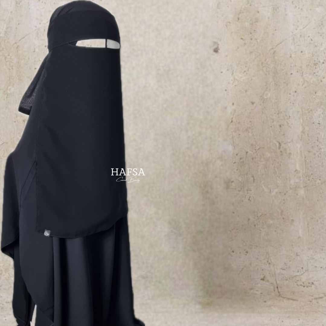 Covered eating Niqab